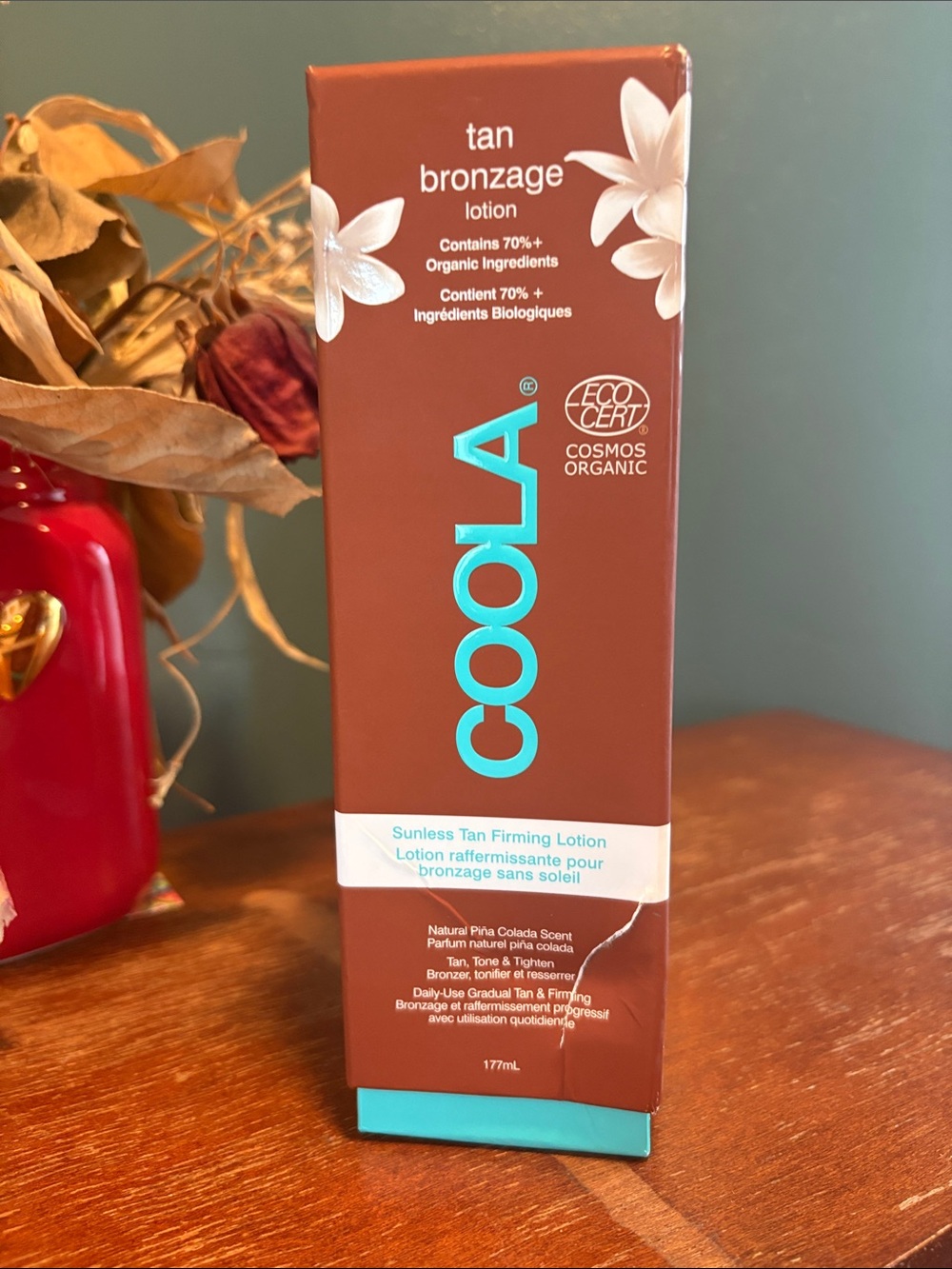 COOLA Tan Bronzage Lotion - Brown with Teal Accents